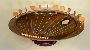 Lyre style Sounding Bowl, 13 strings, in Walnut.