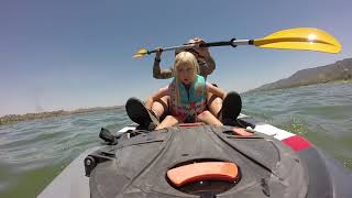 Daddy and daughter kayaking.