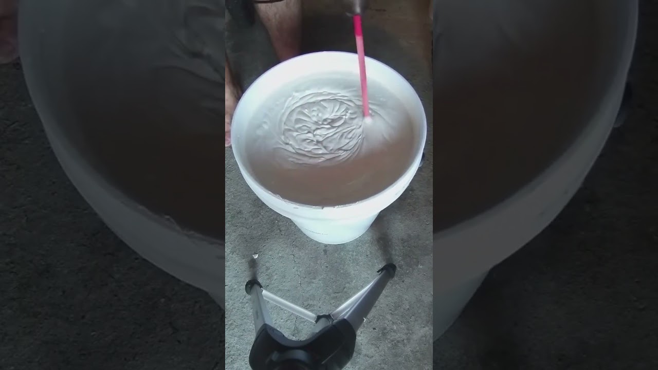 Decanting a 20L Rhinoluxe Shield White waterproof paint 