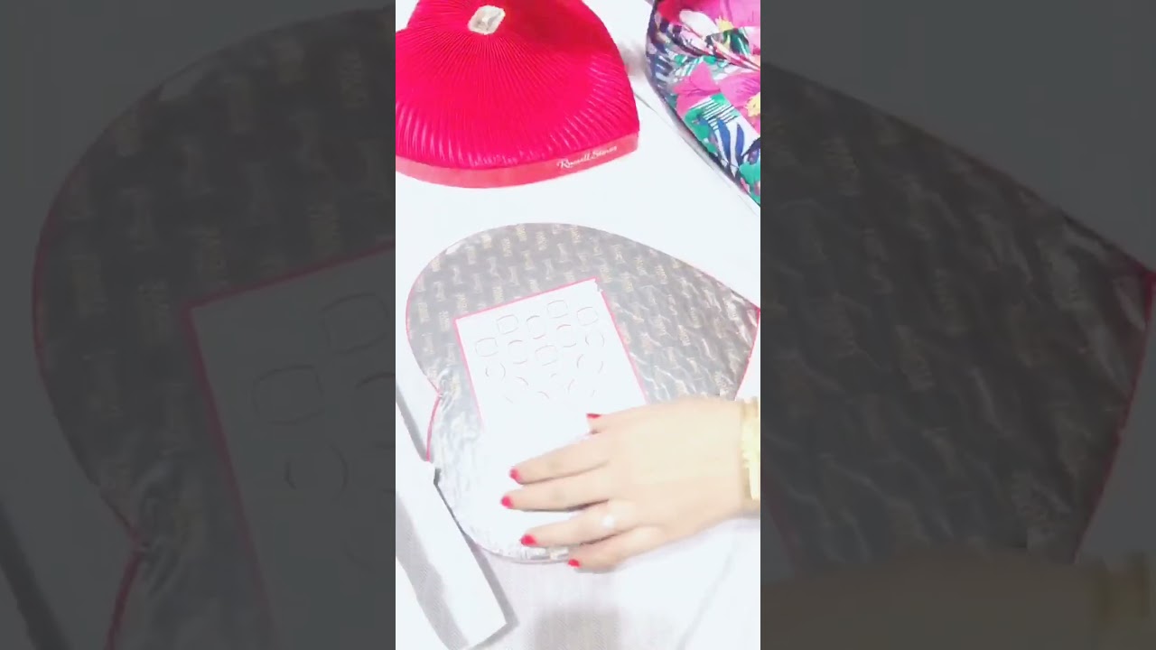 Heart-shaped chocolate box unboxing