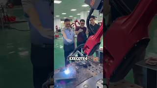 Humans Guide It — The Robot Does the Welding