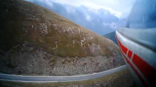 RC DG-1000 Motor Glider in the Clouds over Mountain Top