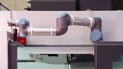 Trailer (60s) - Mounting an Universal Robot UR5 on our CNC mill