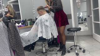 Beautiful Barberette Giving Haircut