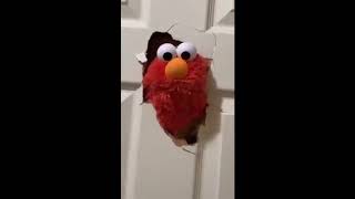 Elmo Smashes Through Door