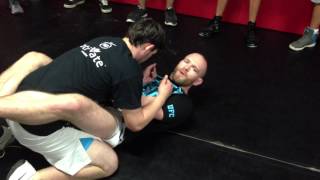 UFC fighter-T.J Grant demonstrates jiu jitsu armbar on kid