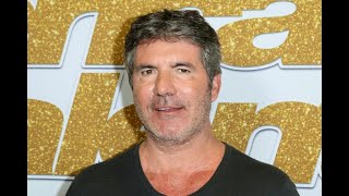 Simon Cowell has surgery for broken back after bike accident