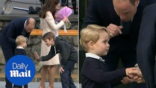 Prince George rejects a high five but accepts handshake