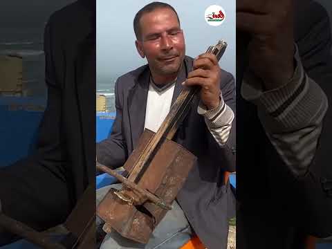 صنع كمانجة من خيوط الصيد وفرامل دراجة