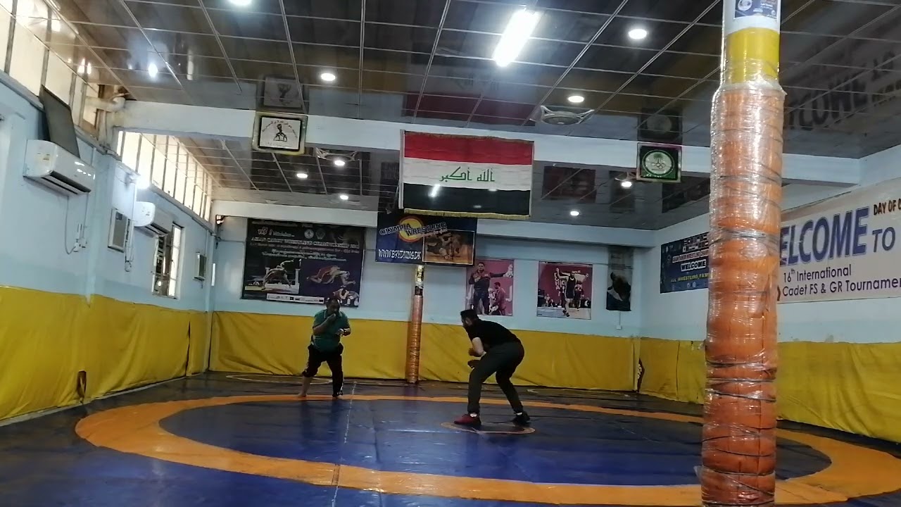 مصطفى رشيد المصارع مع مدربه القدير عارف جبار