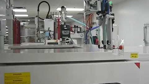 Degating station for lenses