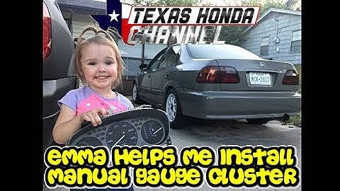 My daughter helps me install the manual gauge cluster in the civic.
