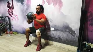 Wall Squat With Madcine Ball