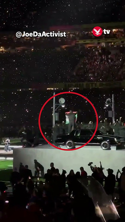 Kendrick Lamar's Super Bowl show interrupted by protest #news #shorts