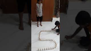 Kids doing Dominoes game