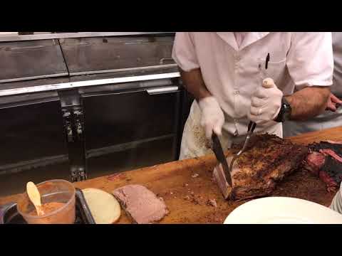 Katz's Deli cutter preparing my brisket on rye