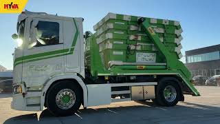 Scania with Hyva skiploader | Loading containers onto a trailer in Frijlink Milieu