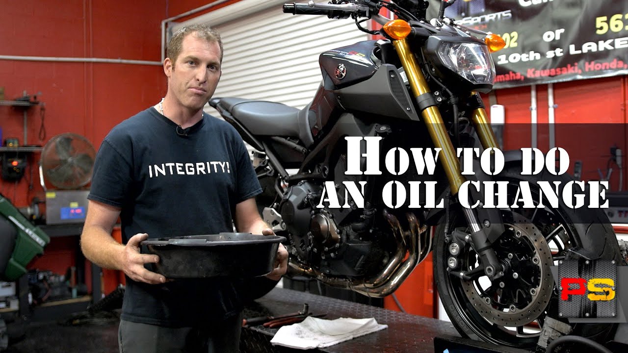 How do you change the oil in a motorcycle?