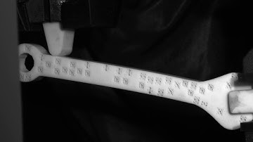 Wrench #5 : functionally graded material with random positioning of unit cells