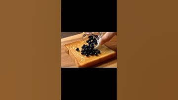Spreading Glass Blueberries on Toast ASMR 🫐 #ai #asmr #aiasmr #satisfying #toastasmr #glassfruit