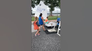 Wooden Optimist sailboat from Museum boat shop used in youth training