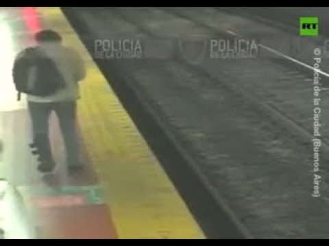 Man glued to his phone falls off subway platform in Buenos Aires