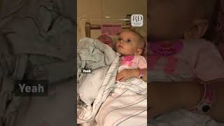 Adorable Toddler Girl is Overprotective of Newborn Sister