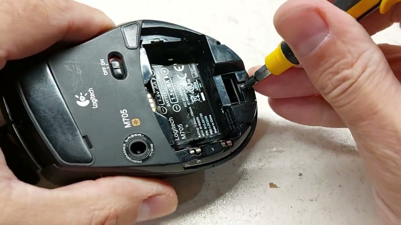 Cleaning a Logitech M705 mouse that had batteries leak inside.
