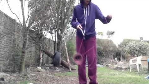 Diabolo trick - two diabolo leg stall