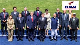 President Trump poses for a photo with world leaders at the G7 summit in Evian, France
