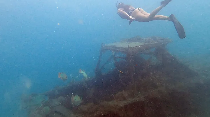 Exploring Julie's Wreck at Sunset at The Blue Hero...