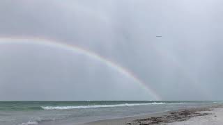 Double Rainbow in Storm Clouds - Time Lapse