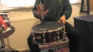 how to do the helicopter (drum stick trick)