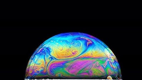 Multi-colored Iris of a Soap Bubble in Motion | Stock Footage - Videohive