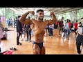 Indian fitness models and muscle men flexing muscles