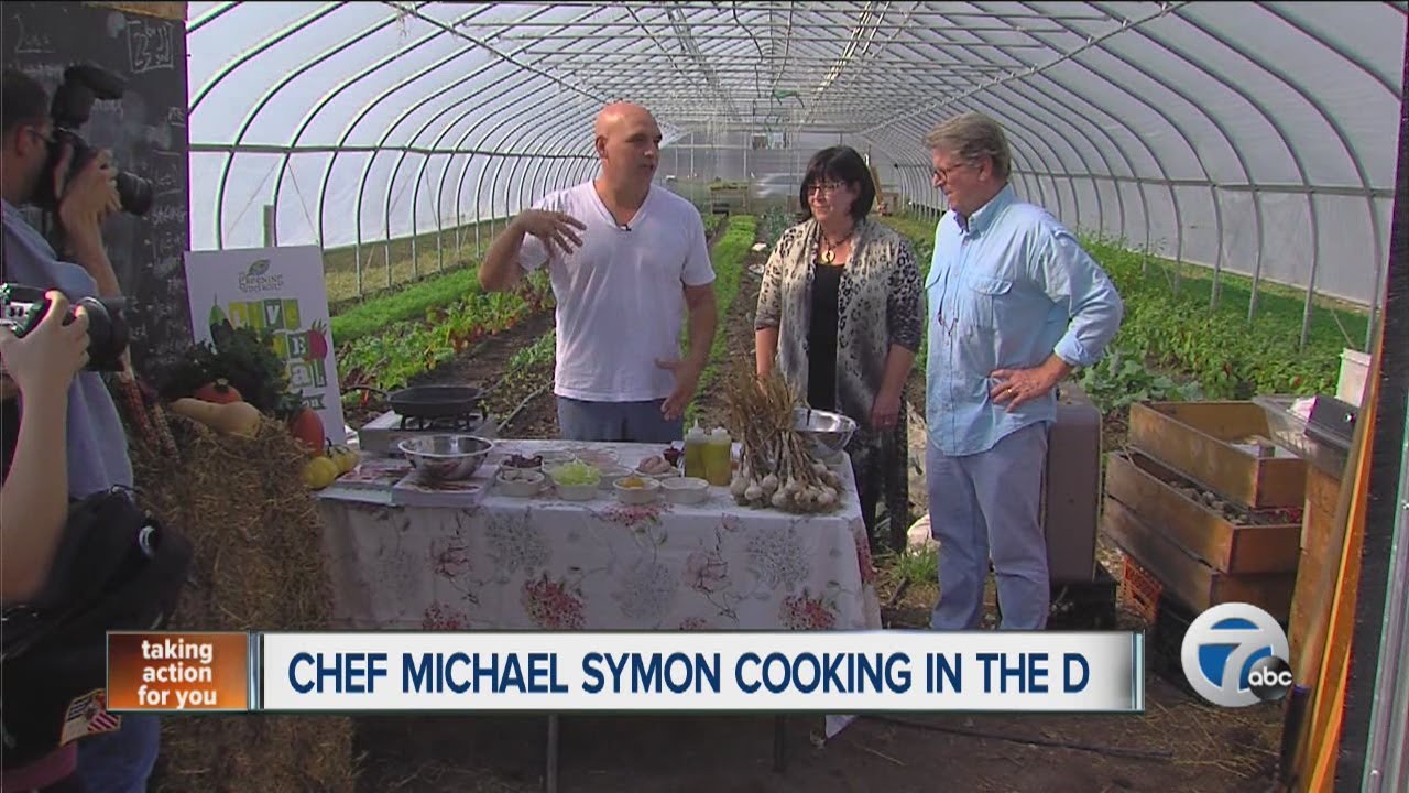 Chef Michael Symon cooking in the D
