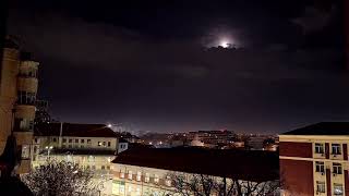 Midnight to Dawn Time-Lapse. Moon behind clouds