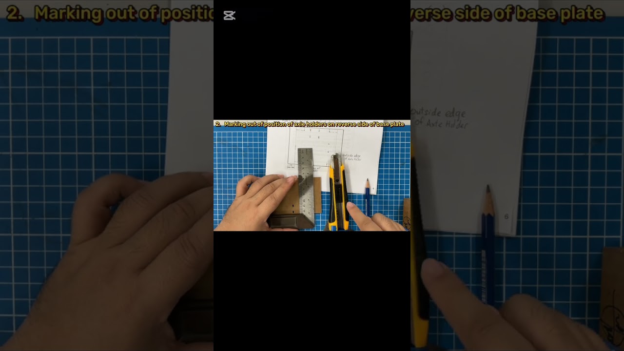 2 .  Marking out position of axle holders on base plate