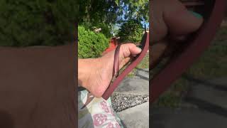 Dangling my flip flops outside