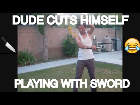 DUDE CUTS HIMSELF PLAYING WITH SWORD (MUST WATCH)