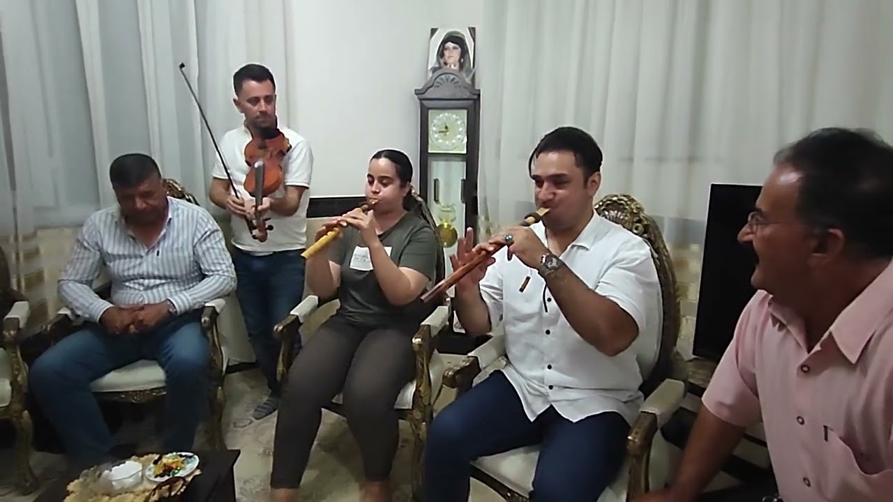 گۆرانی بە عینوانی وەستا جەلیل لە بۆکان لەگەل حامید ژەنیارو چەند ژەنیارێکی بۆکان