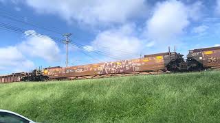 (Heritage happy meal!!) CSX 1877 leads I032 past the Mcdonalds parking lot in Newark DE!!