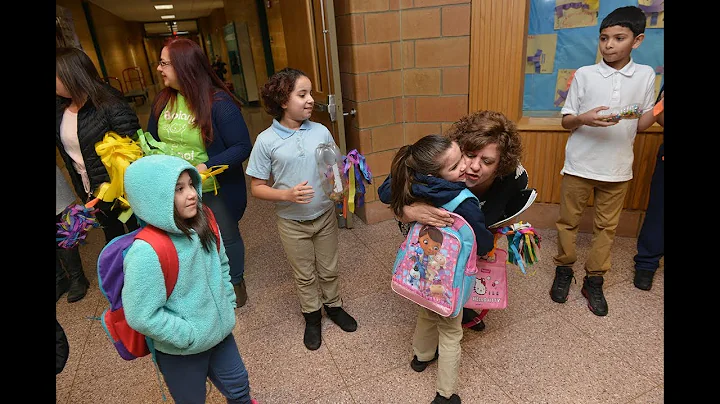 Cheers greet students as the Edward P. Boland Scho...