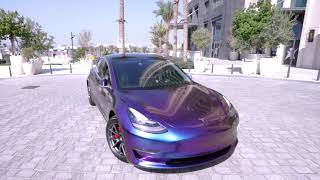 Tesla Model 3 Wrapped in Chameleon Purple Purple Tesla Model 3