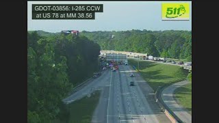 FedEx driver and dog die in fiery wreck in DeKalb County