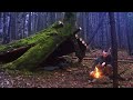 Building a survival shelter on a brokeback mountain  solo camping in rain