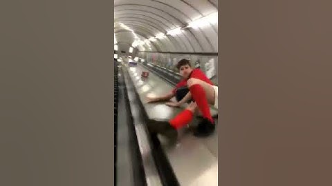 Drunk Slides Down Tube Escalator [FAIL]