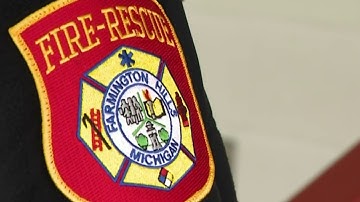 Firefighters working to install free smoke detectors