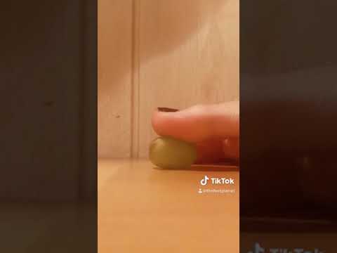 Feet crushing grape