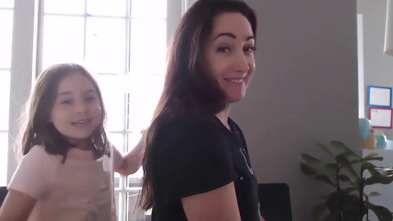 Elise doing Mommy's hair